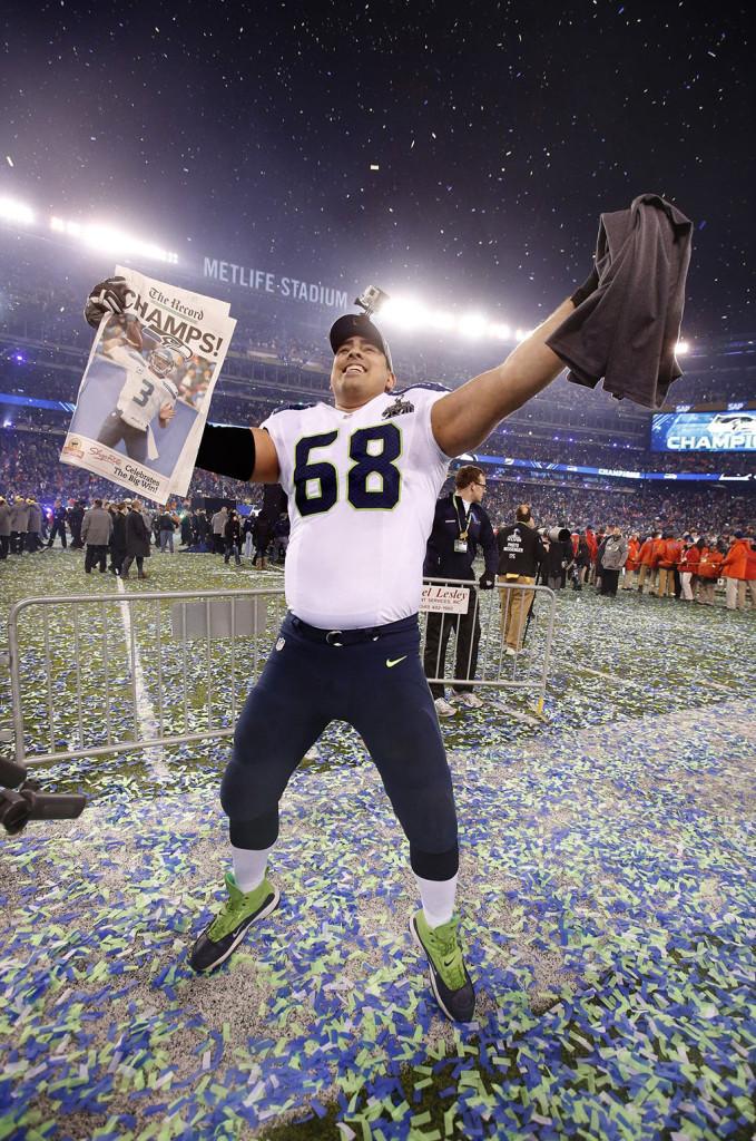The Seattle Seahawks Breno Giacomini celebrates after a 43-8 victory against the Denver Broncos in Super Bowl XLVIII at MetLife Stadium in East Rutherford, N.J., on Sunday, Feb. 2, 2014. (Tony Overman/The Olympian/MCT)