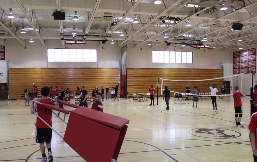 Photo of the Day: Boys Volleyball Cleans up the Court
