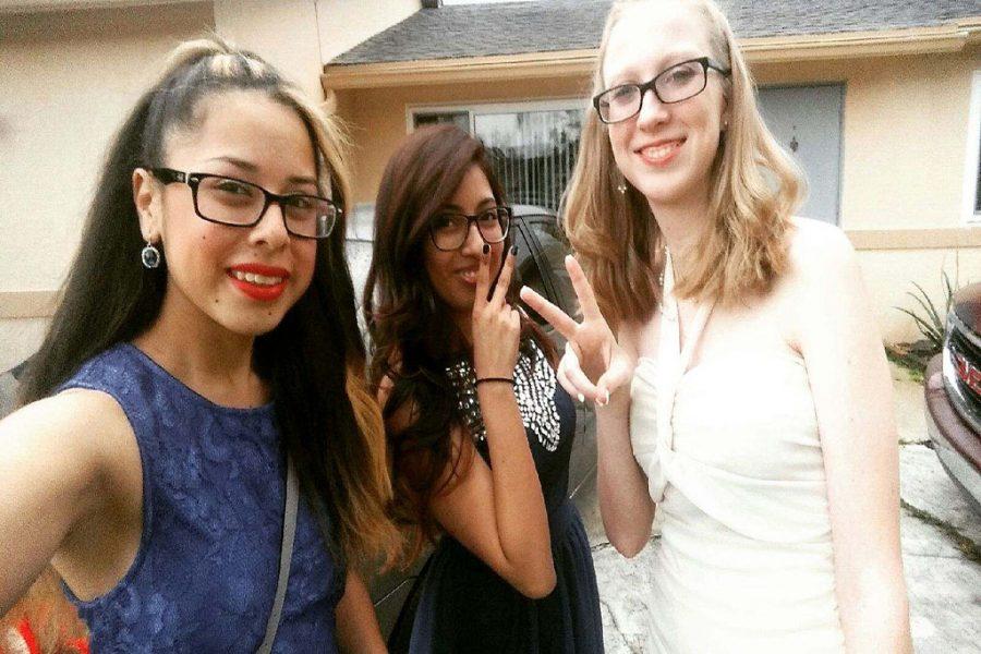 Cindy Campos, in the blue dress, attended prom with two of her friends. 