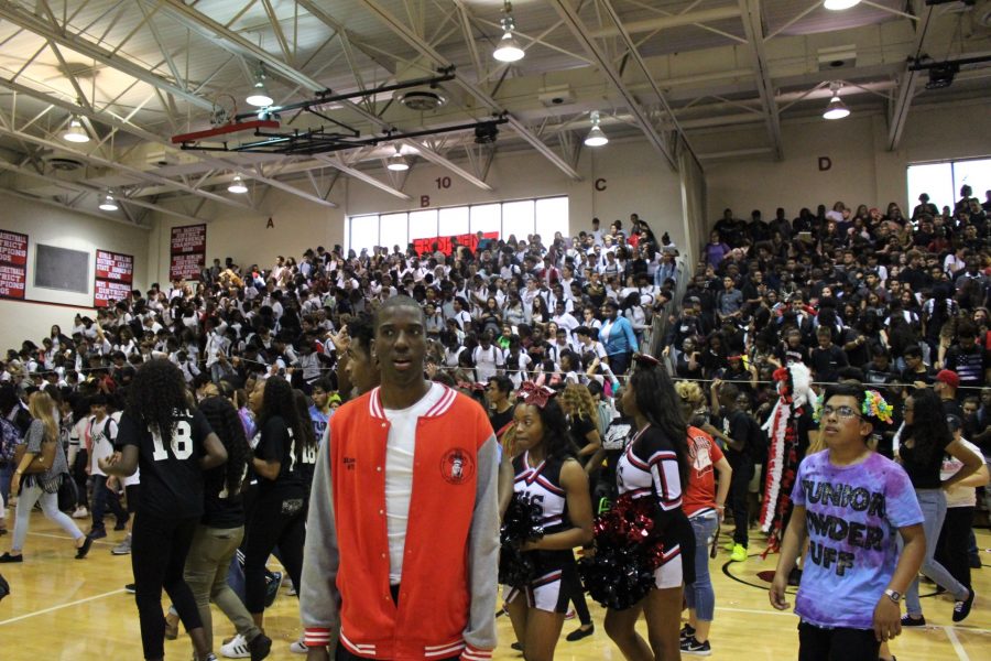 Senior Student Class President, Edwin Ross, stands in astonishment after losing the spirit stick.