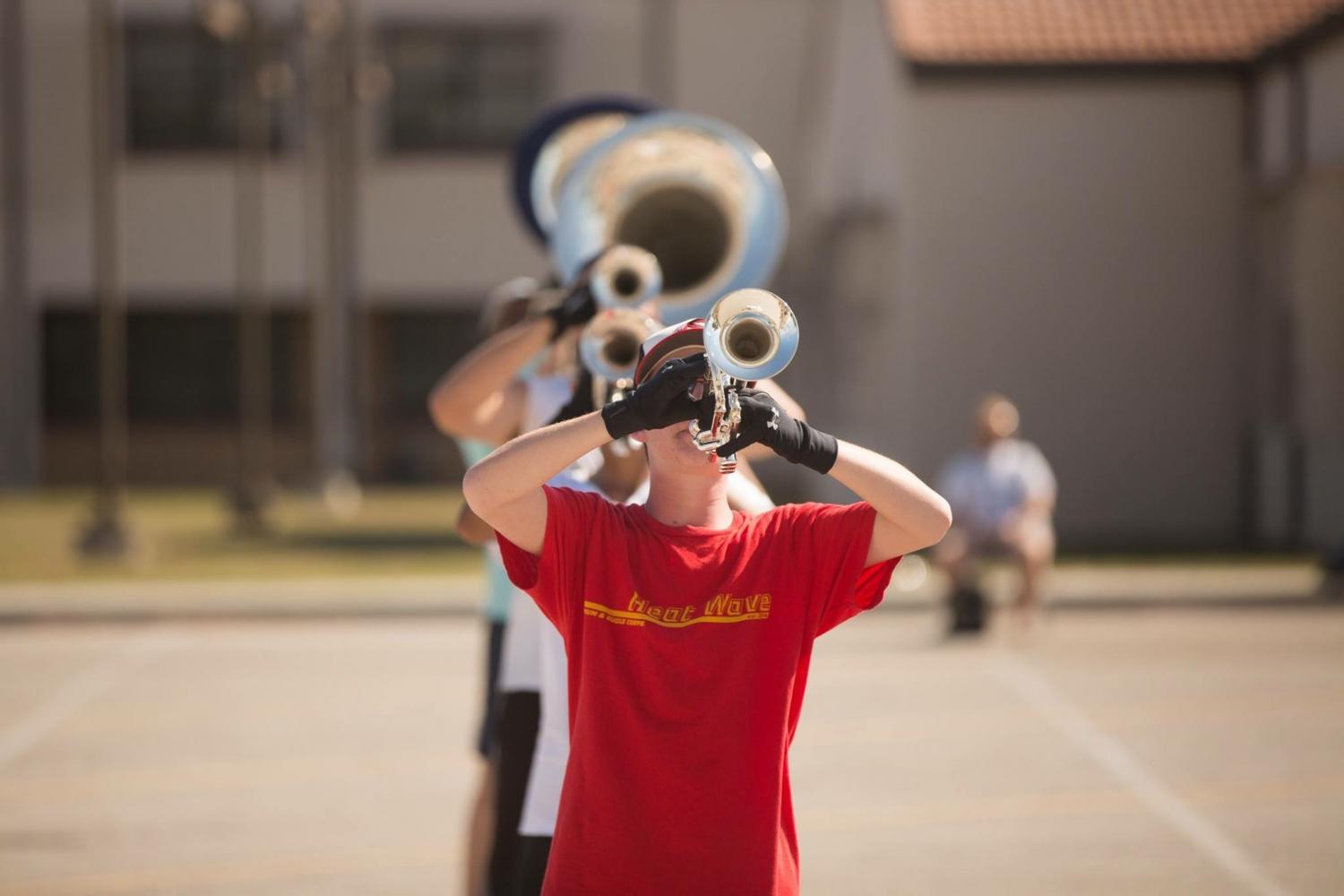 TJ performing as lead trumpet in Heat Wave