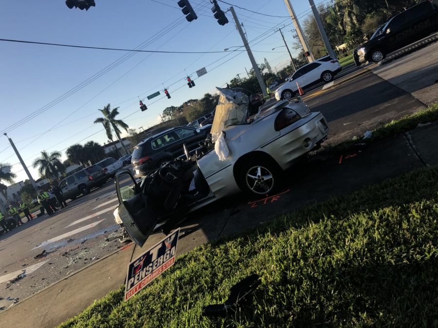 Silver car affected by the crash.