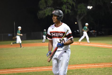 Junior Yash Patel returns to the dugout.