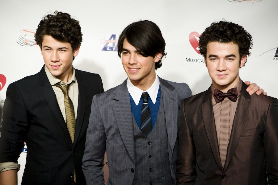 The Jonas Brothers at an awards show during their 2013 prime.