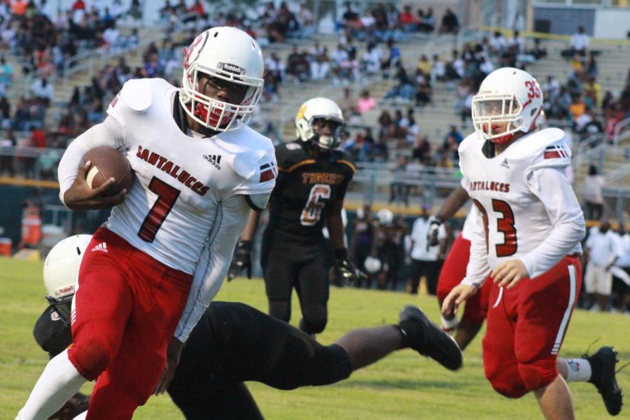 Eric Wallace approaches the end zone to score a touchdown.