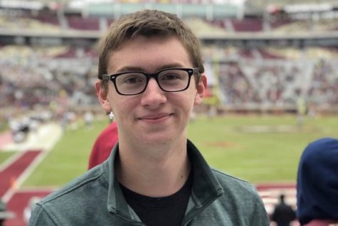 Ethan is at an FSU football game.