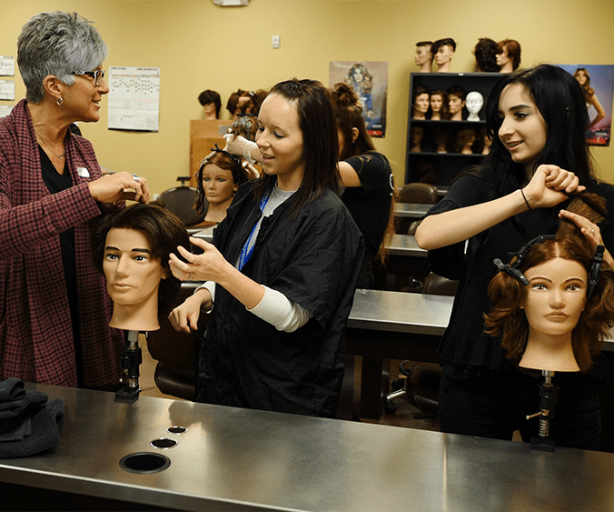 Cosmetology+students+often+learn+and+practice+on+mannequins+before+testing+their+skills+on+a+person.