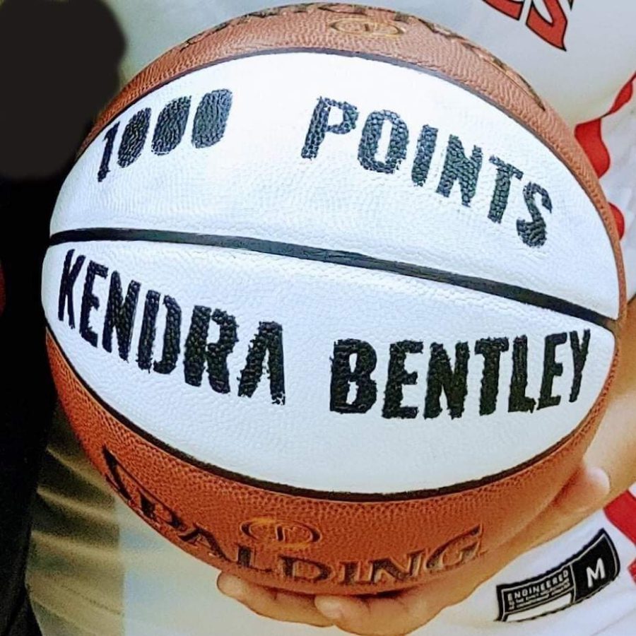 Kendra+Bentley+was+presented+with+a+hand-painted+ball+to+commemorate+her+achievement.
