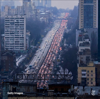 Picture showing a trafficked highway in Ukraine with people trying to Flee the country.