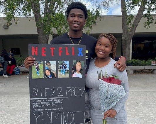 She said yes to his Netflix-themed prom proposal.