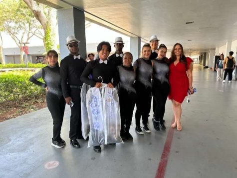 The latin dance team on their way to preform at the Santaluces board meeting 