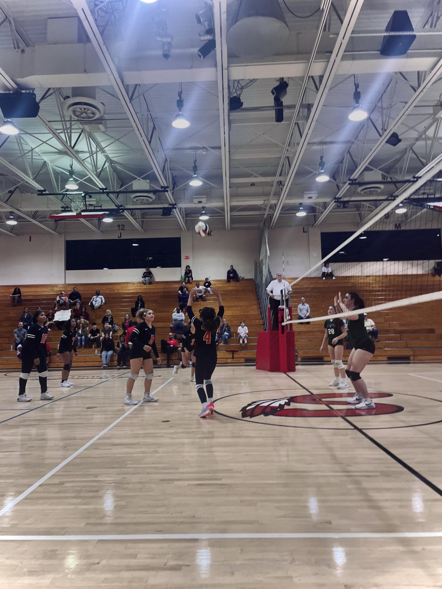 The Lady Chiefs setting the ball for the  first set.