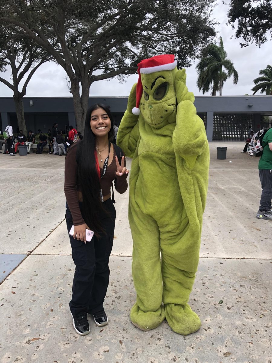 Cindy and the Grinch striking a pose