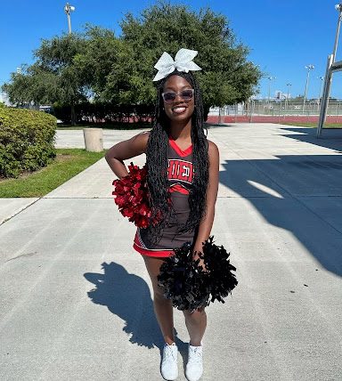 Ashlee in her cheer uniform