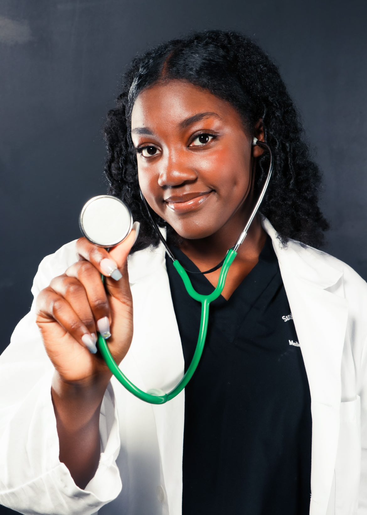 Dainelle Mildorts senior photo showcasing her passion in the medical field.