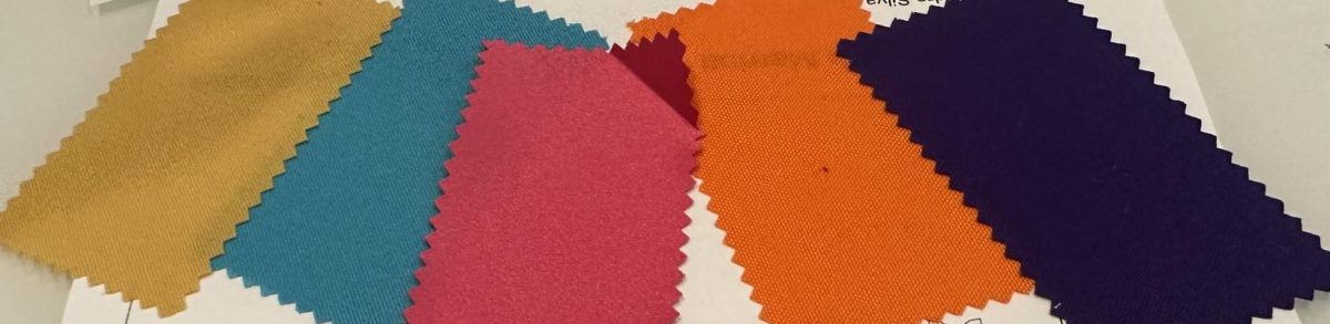 Fabric swatches of the color scheme provided by the decorator.