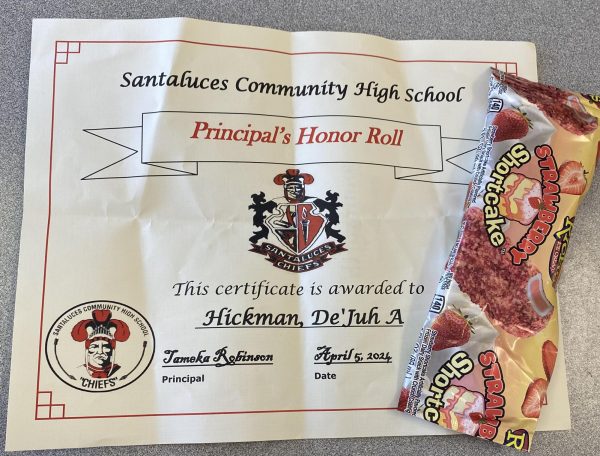 Dejuhs Honor Roll certificate and the ice cream that she chose.