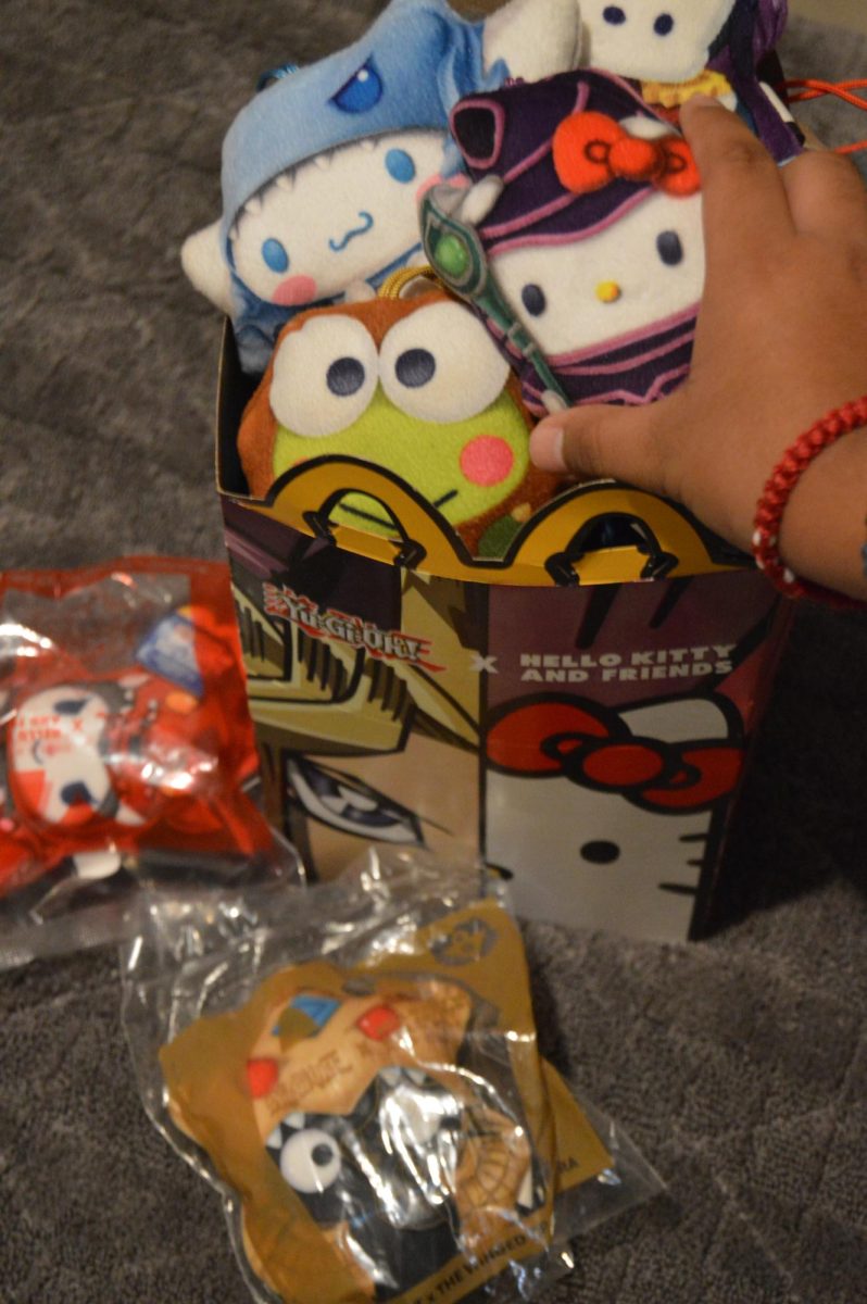 McDonald's Happy Meal box filled with
Yu-Gi-Oh x Hello Kitty Happy Meal Toys