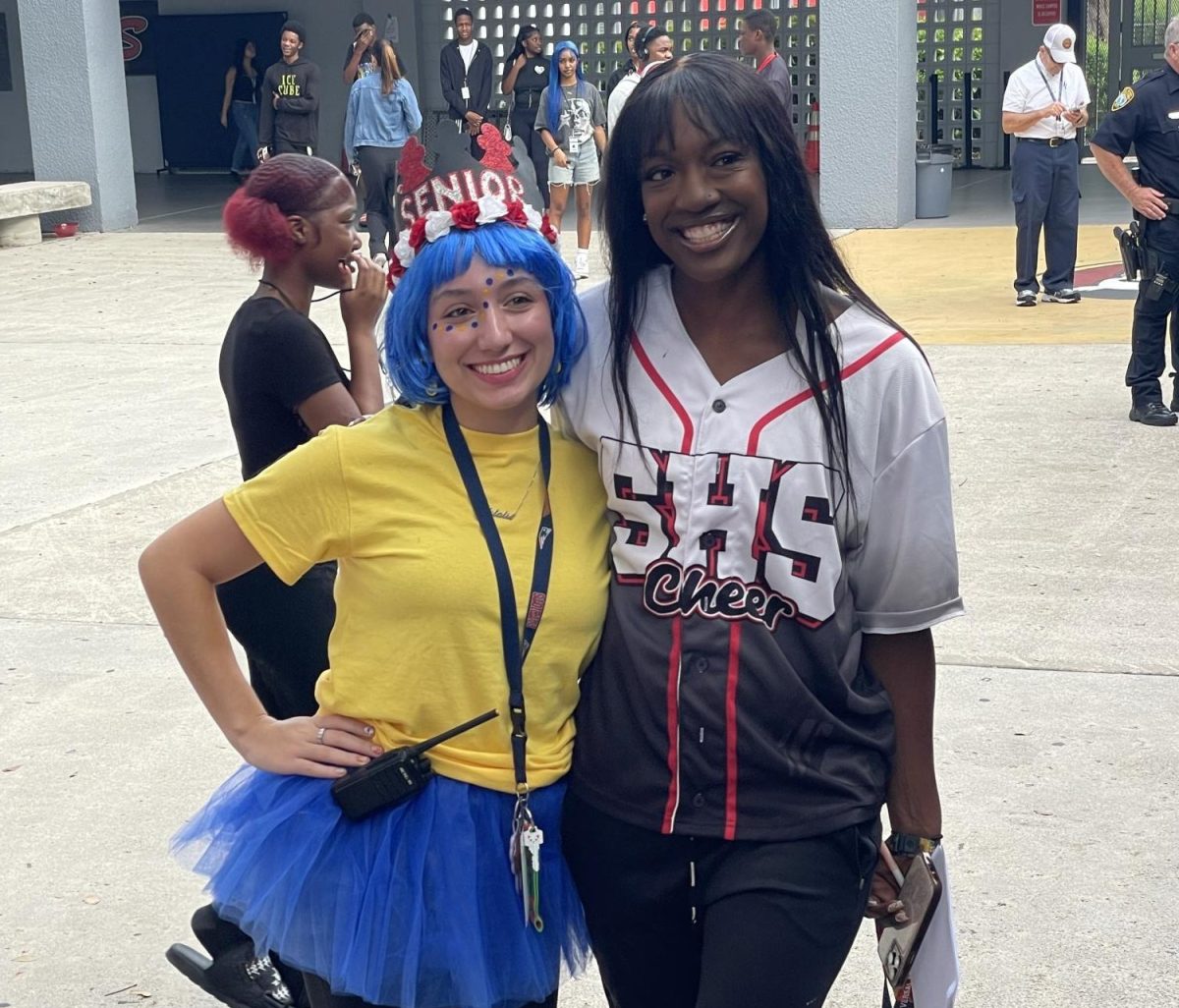 Natalie and Coach Ross showing school spirit dressing up for this week's pep rally. 