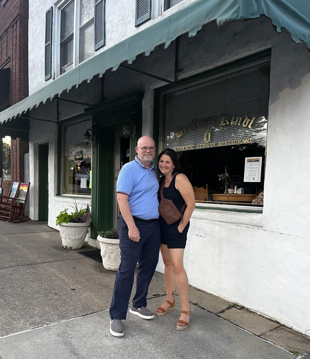 Mrs. Mangone and her husband Roger in front of Berliner Kindl.