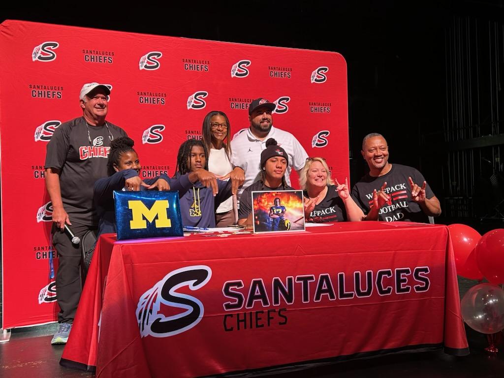 Families of Jamar Browder and Caden Gordon during National Early Signing Day.