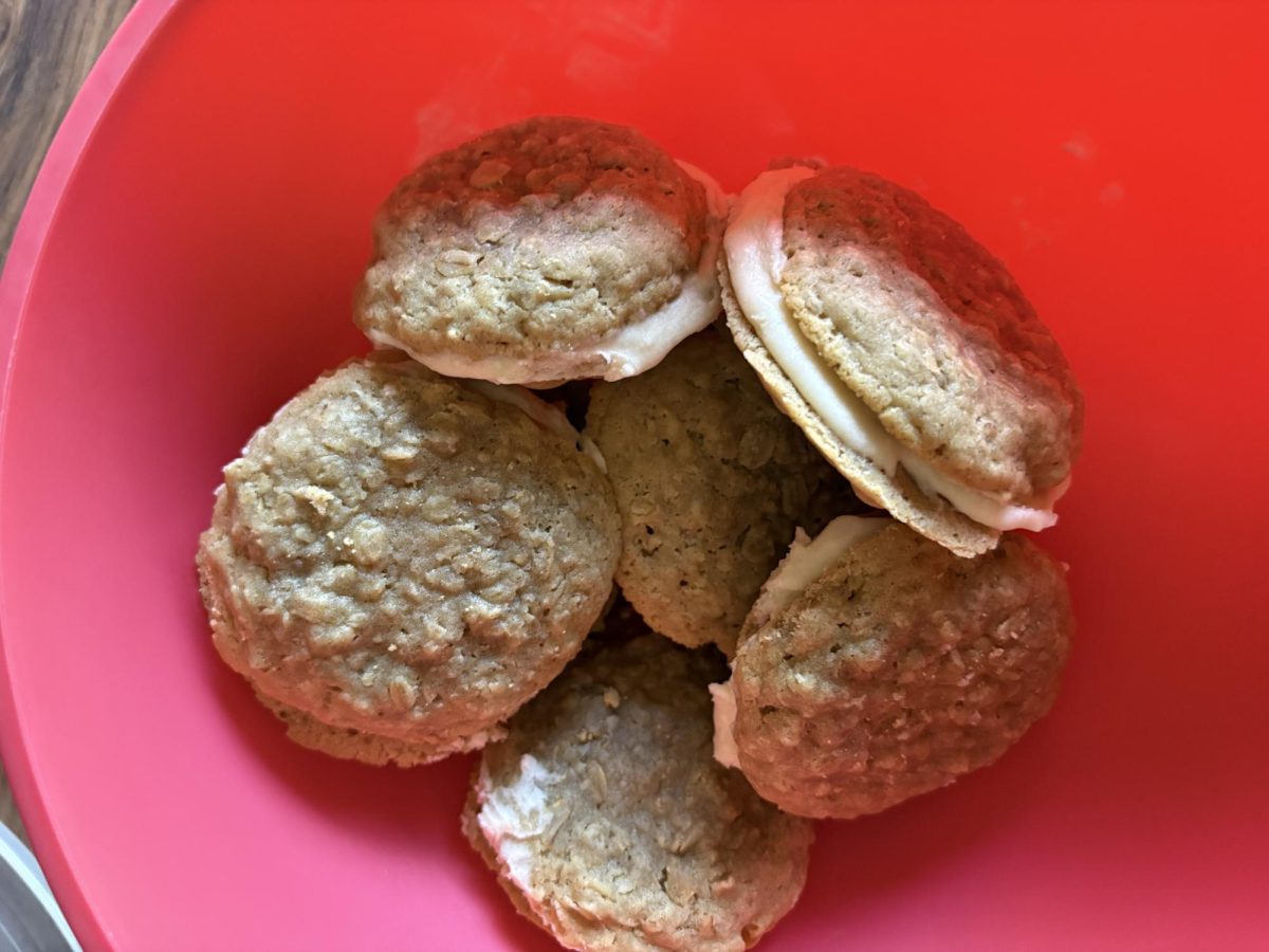 Homemade oatmeal cream pies in a bowl.